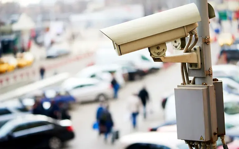 Bullet camera monitoring a car park