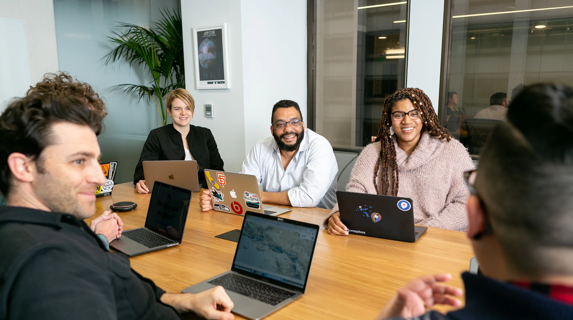 Engineering team meeting around a table