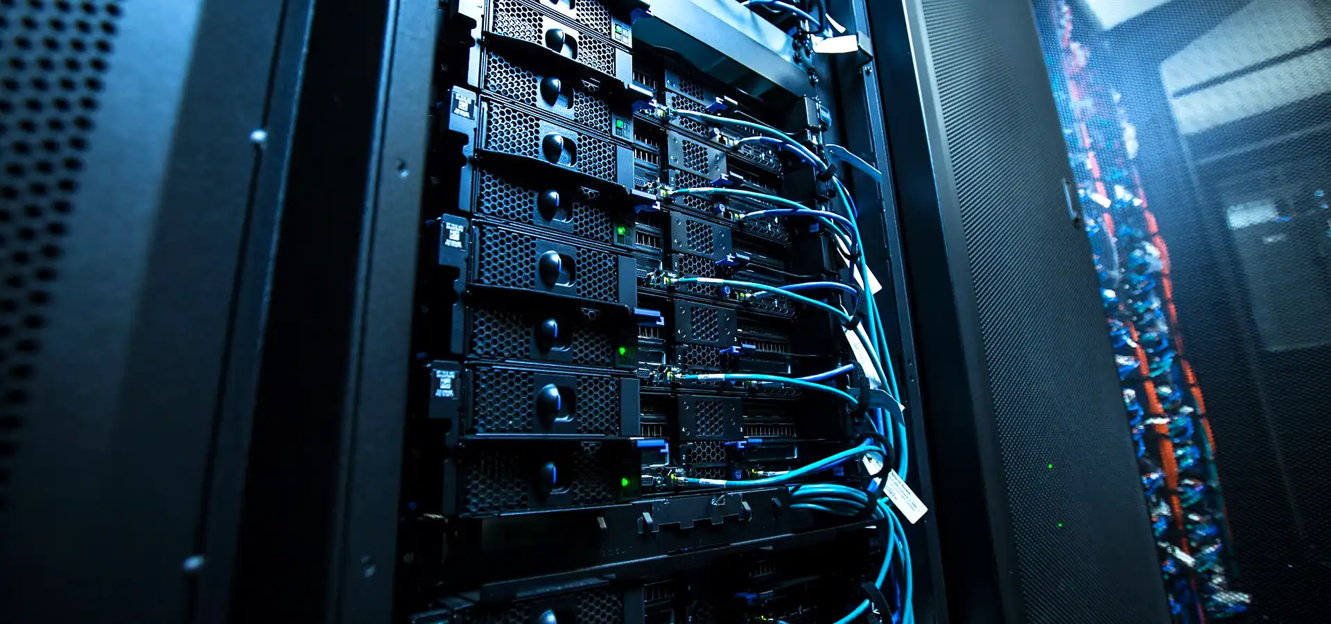 Server rack with neatly patched network cables in an ICT room